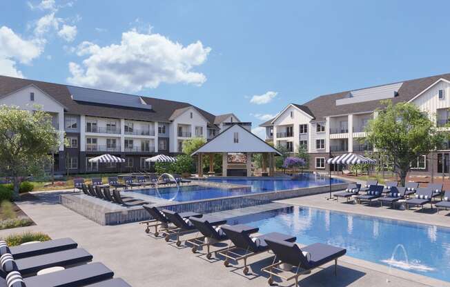 Pool and sundeck with loungers at The Howard Apartments in Manor, Texas