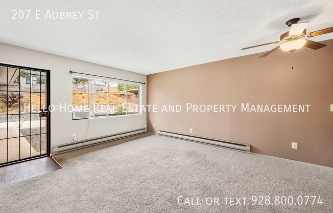 207 E AUBREY ST