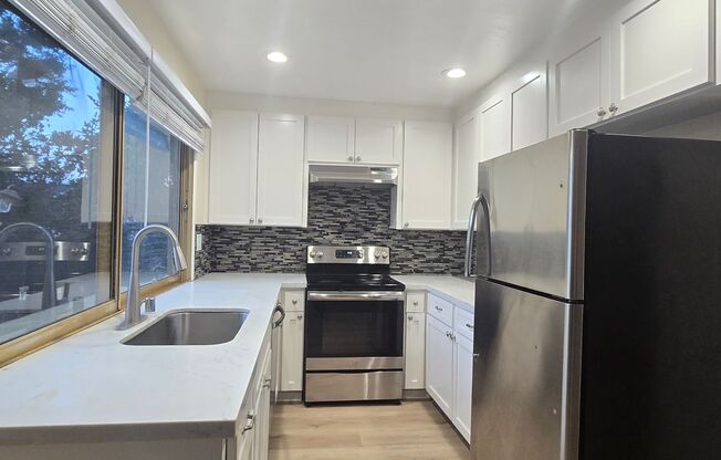 Spacious Single Family Home, Fresh Paint, New Wood Flooring, Nice Yards!
