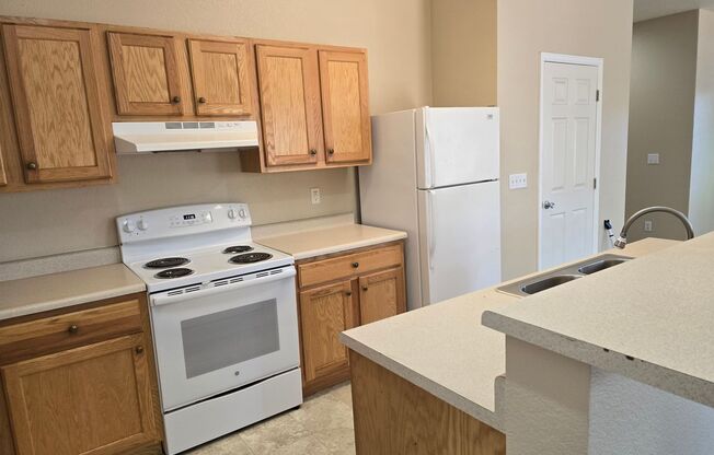 Three-bedroom condo in Denver boasts a large private yard and many additional features!
