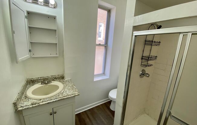 2504 N Calvert St – Your Timeless Urban Retreat!