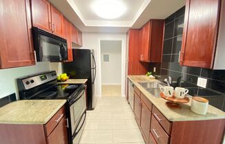 Beautiful Two Bedroom Two Bathroom Condo W/ Balcony & In Unit Laundry!