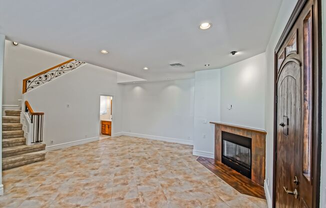 SPACIOUS & BRIGHT, TWO-STORY HOME W/ FRONT YARD, BALCONY & 2-CAR GARAGE CLOSE TO SHOPPING, FREEWAY ACCESS, RB BORDER & MINS TO BEACH!