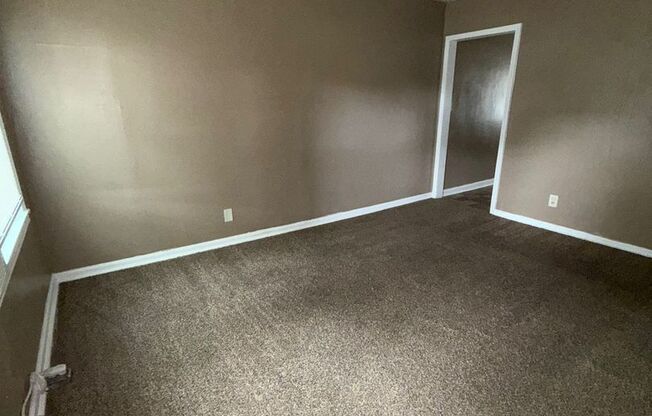 Charming 2-Bed End Unit in Quiet Quadplex- Move In Ready!