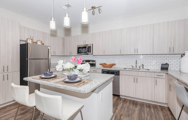 Modern Fully Equipped Kitchen at One White Oak Apartments in Cumming, GA