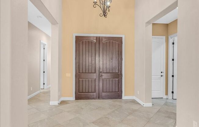 Stunning 1-story home in the prestigious Club at Madeira Canyon guard gated community!