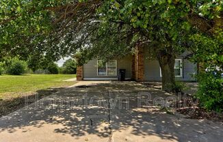 310 NW 118 ST