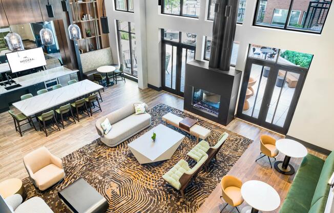 Overhead view of the clubroom with bright open windows overlooking the interior courtyard.