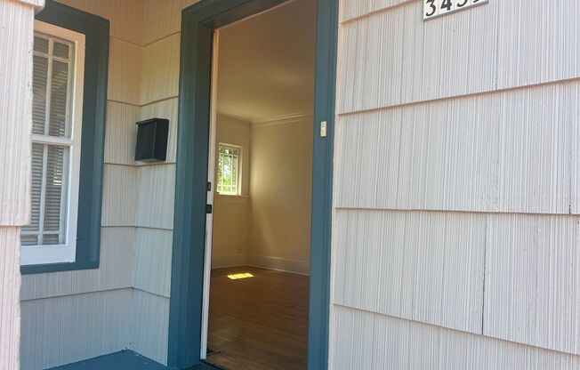 Charm Galore in this Beautiful 1920s Home near Fremont. Fresh Paint inside and out! New carpet