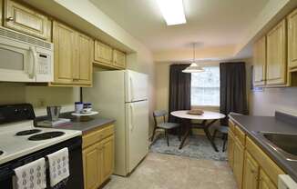 Kitchen with eat-in dining table and window