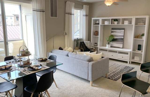 Living Room With Dining Area at San Marino Apartments, South Jordan, UT