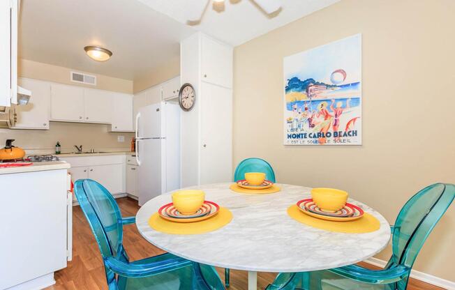 a kitchen with a dining table