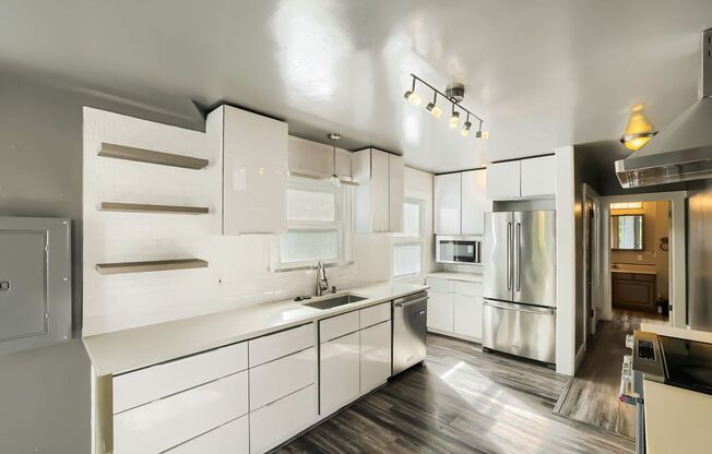 Amazing 3bed/4bath Home with 3 Additional Flex Rooms in University District!