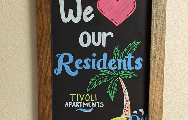 a framed sign that says we our residents and our residentsovy apartments