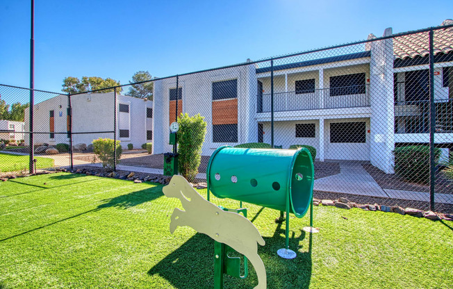 a dog park in front of a building