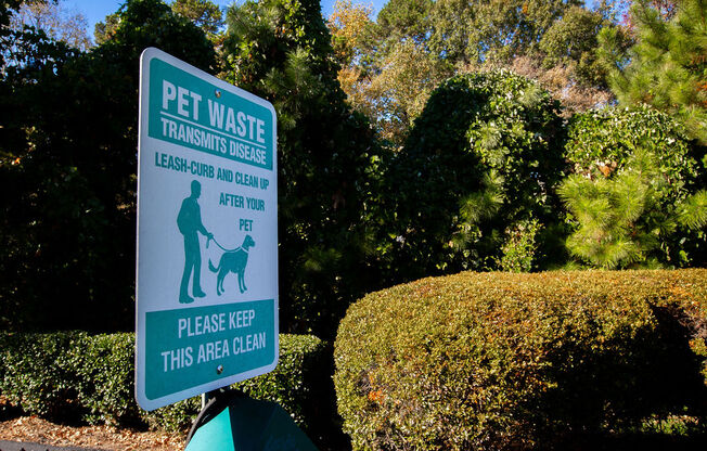 a sign that reads pet waste transforms dogs please keep this area clean