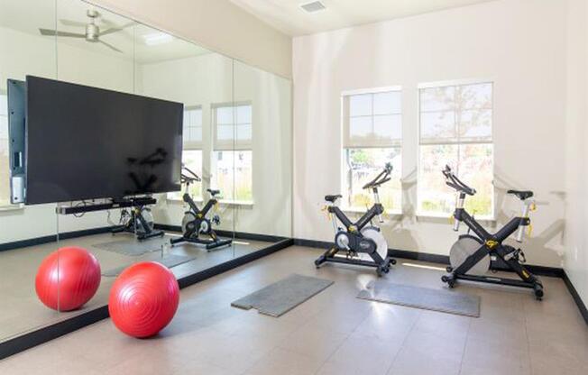 Spin room at Fitness Center at Parc on Center Apartments & Townhomes, Orem