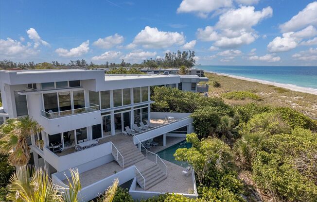 Beach Access & Gulf Views From This Incredible Luxury Home on Longboat Key