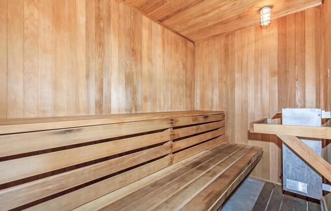 a wooden bench on a wood floor