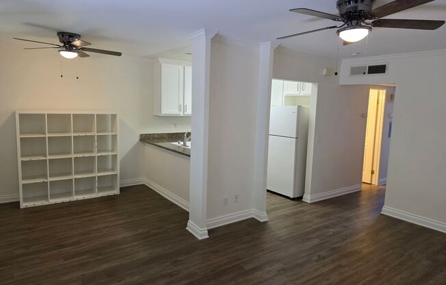 Renovated upstairs 2 bedroom 2 bath condo in a gate community available now