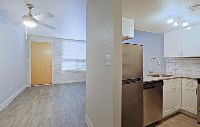 Living room and kitchen at Allora Phoenix Apartments, Phoenix, AZ