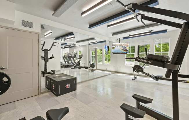 a room filled with lots of exercise equipment