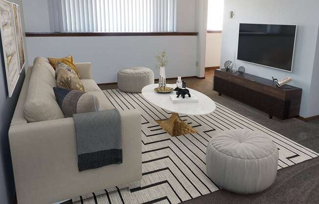 living room with window and mini blinds in winchester apartments