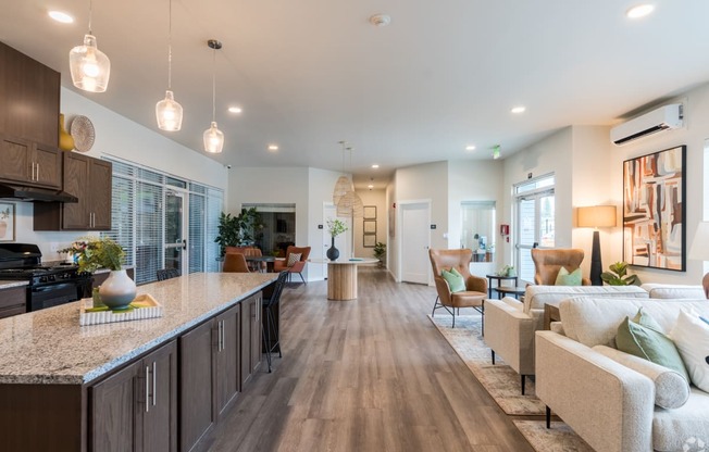 an open floor plan with a kitchen and living room