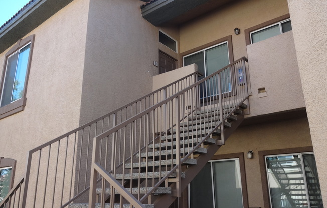SECOND STORY CONDO IN GATED COMMUNITY WITH ACCESS TO POOL/SPA