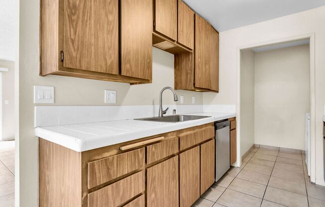 Great three bedroom/two bath single level corner townhome in UTC!