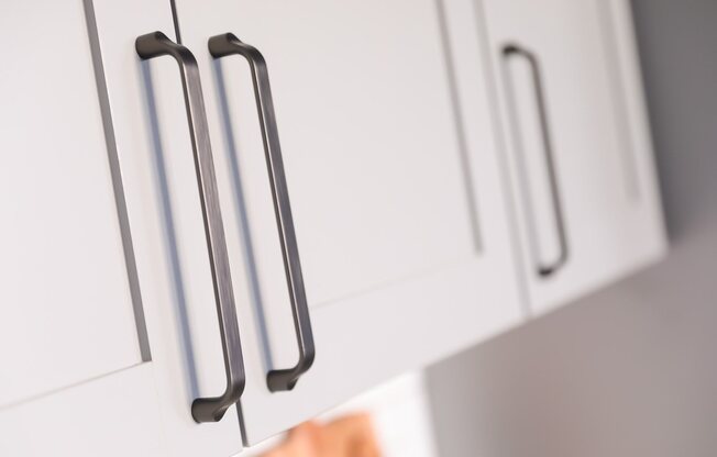 Designer cabinet pull handles on hand-crafted shaker style cabinets at Vesi