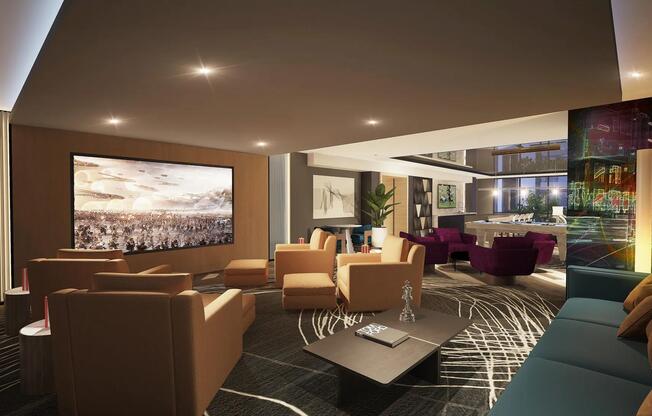 Media room with large screen and comfortable seating.