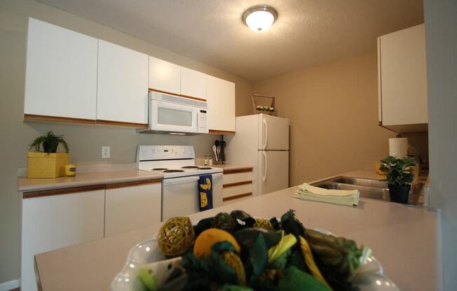 This is a photo of the kitchen in the 1040 square foot 2 bedroom Patriot at Washington Place Apartments in Washington Township, OH.