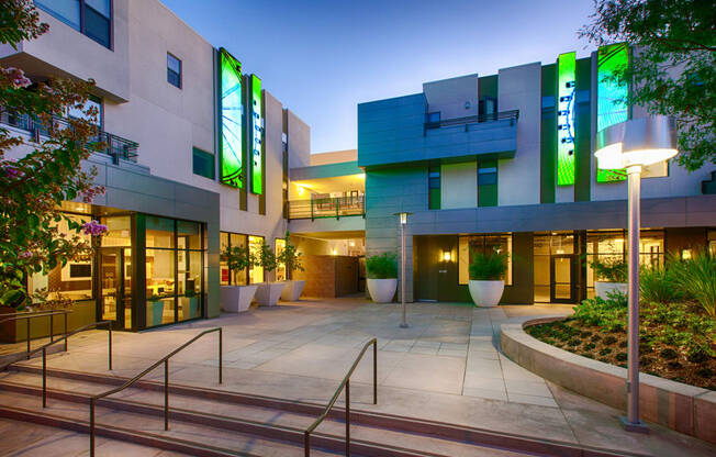 a picture of the front of the building at night