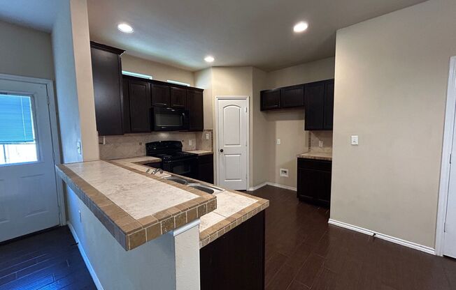 2 Story Unit / Washer, Dryer Connections on 1st Floor / Fenced in Yard / CISD