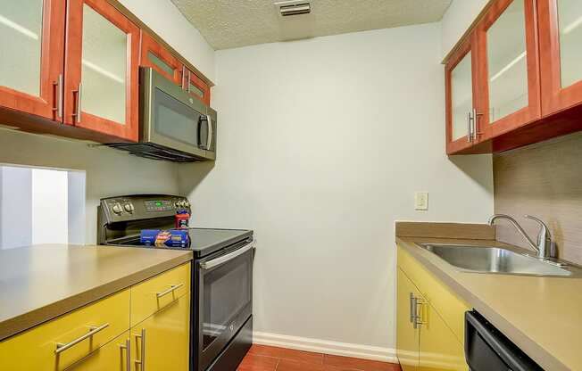 Apartment Home Kitchen at Fernwood Grove Apartments at 4900 MacDill Ave in Tampa, Florida