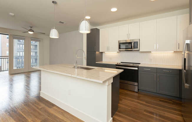 Kitchen with Stainless Steel Appliances and Breakfast Bar