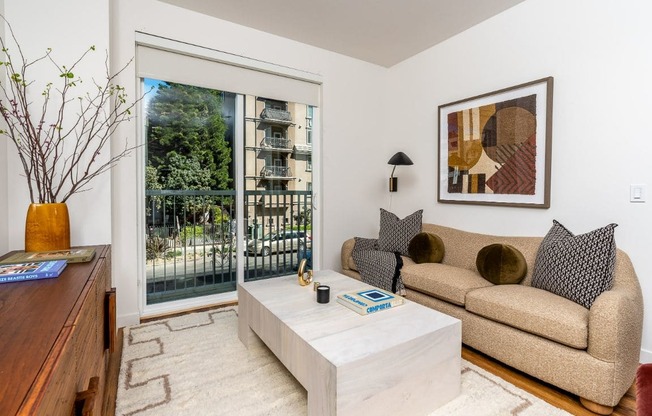 Living Room With Balcony at Fedora Bliss LLC, California