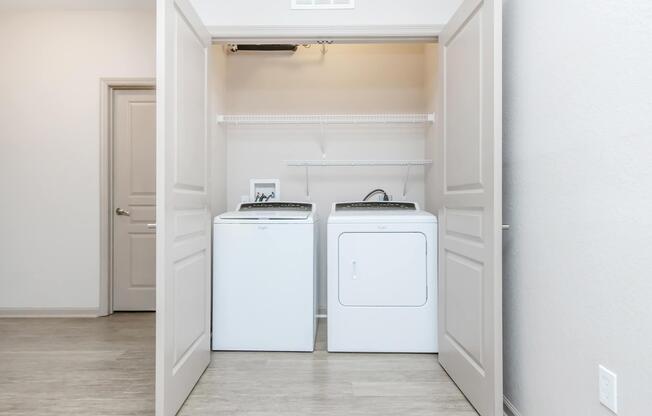 a refrigerator freezer sitting inside of a building