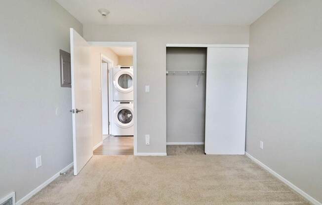 A laundry room with a washer and dryer.