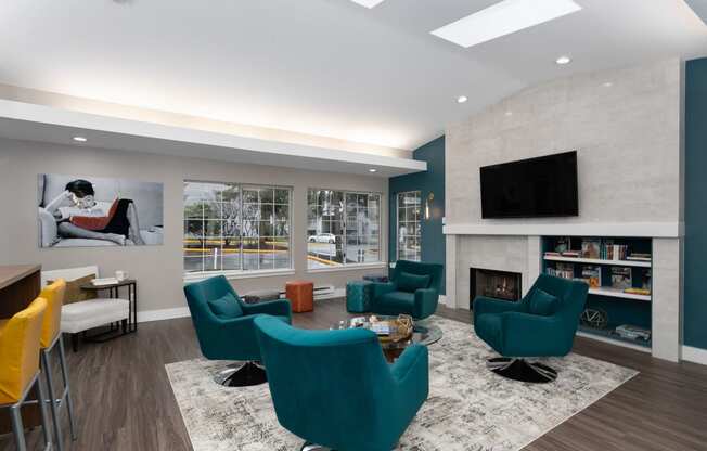 Novela Apartments Clubroom Seating Area and Television