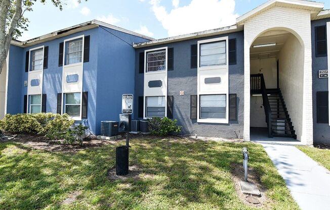 UPDATED KITCHEN!!! 2BR 1BA in Windmill Point. Waterford Lakes/UCF area. ALL TILE FLOORS, Community Pool!