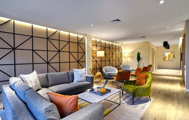 Elegant lounge area at The Mint Rahway featuring stylish seating and decor, conveniently located near Merck Pharmaceutical and Rahway Train Station.