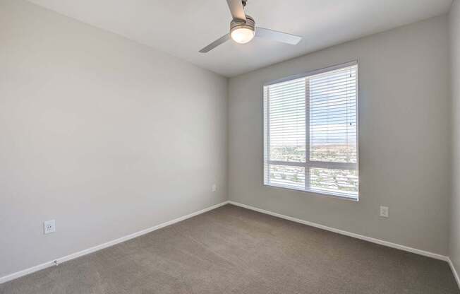 Secondary bedroom with ceiling fan at The Overlook Santa Clarita, CA 91350