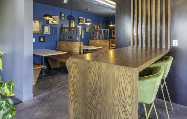 a restaurant with a wooden table and chairs