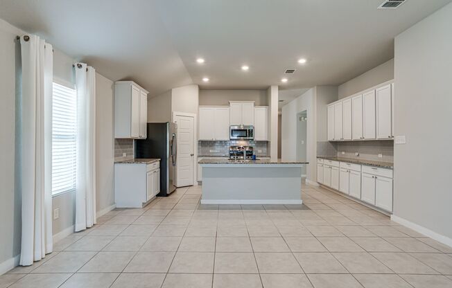 Stunning like new single story 4 bedroom 3 bath home!