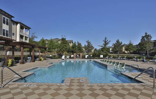 our apartments have a large resort style pool with lounge chairs