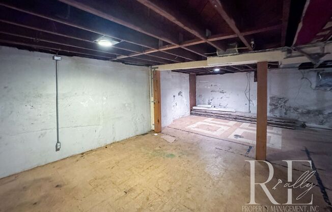 Light-Filled Home with Vaulted Ceilings, Bonus Basement & Walkable Location