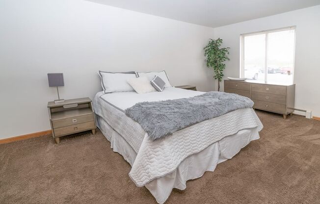 Bedroom with bed at Martin Estates Apartments, Indiana, 46176