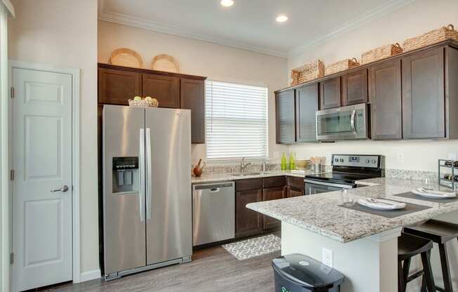 Horizon at Premier Apartments Model Kitchen with Stainless Steel Appliances and Breakfast Nook.